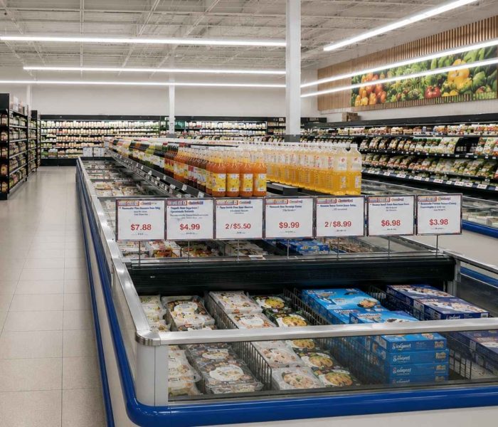 Asia Food Mart supermarket aisle with frozen food cases and refrigerated grocery displays installed by ColWell Refrigeration.