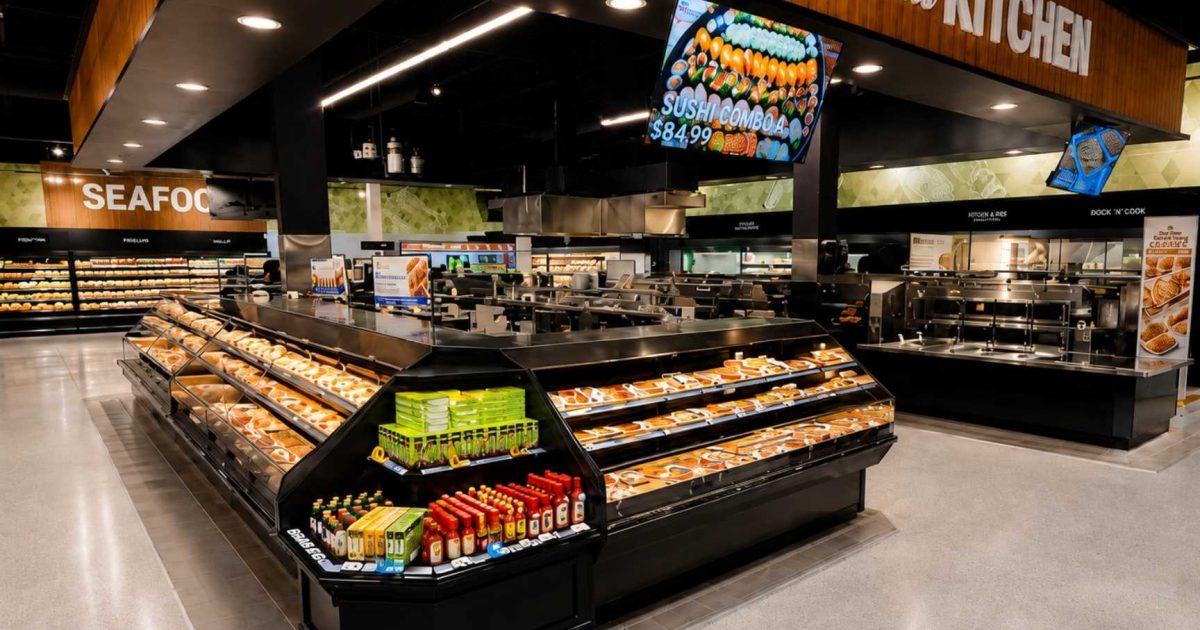 Galleria Supermarket K Town seafood and prepared food area with commercial refrigerated display cases installed by ColWell Refrigeration.
