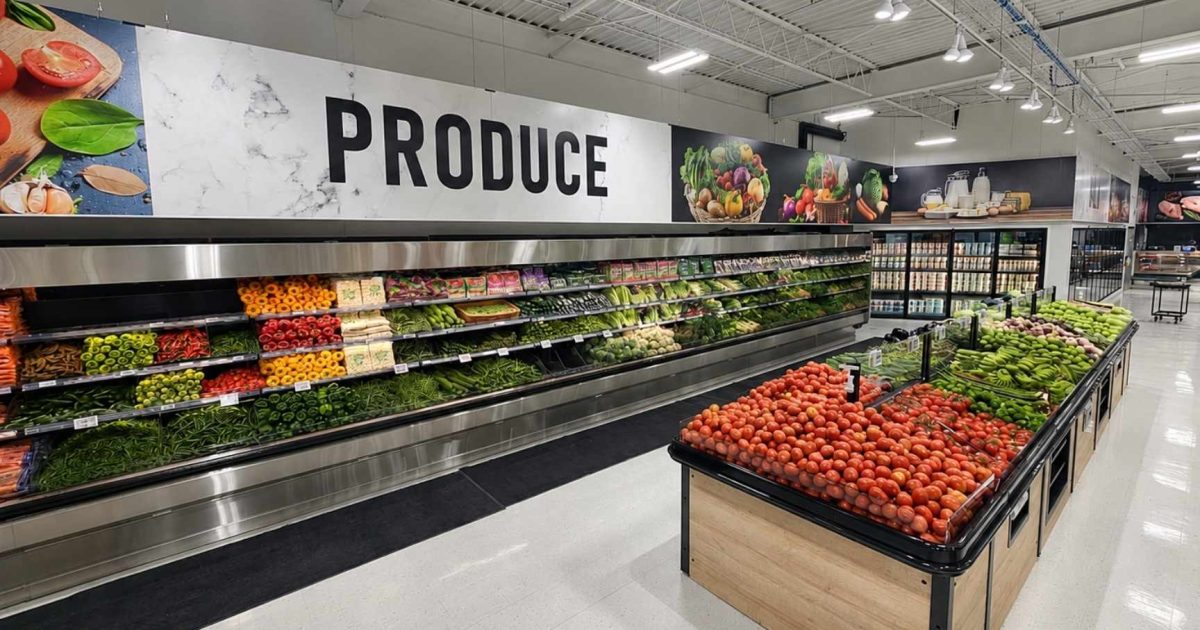 Iqbal Foods produce department with commercial refrigerated displays installed by ColWell Refrigeration.