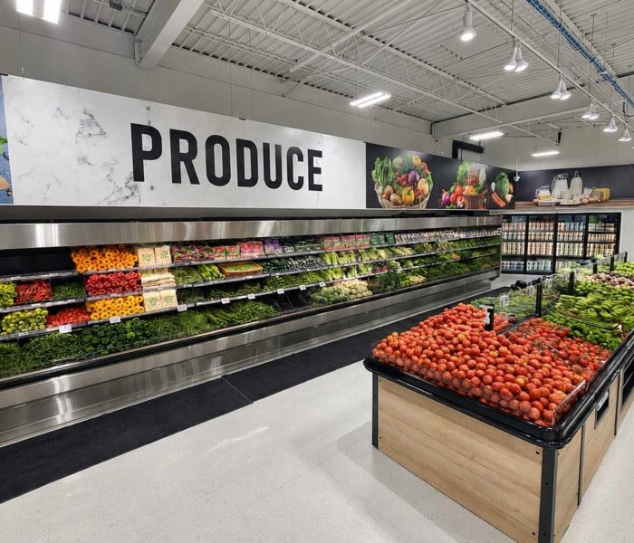 Iqbal Foods produce department with commercial refrigerated displays installed by ColWell Refrigeration.